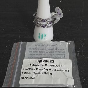 Intricate Crossover Ring with Purple Stones